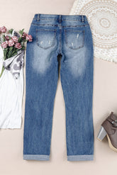 Distressed-Jeans mit Patchwork-Muster und Blumenmuster